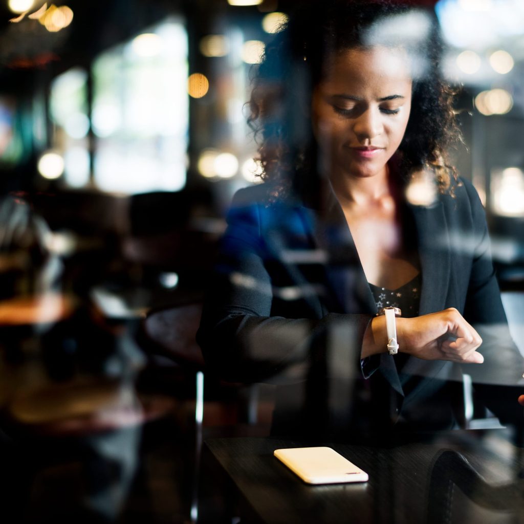 Woman waiting at a cafe